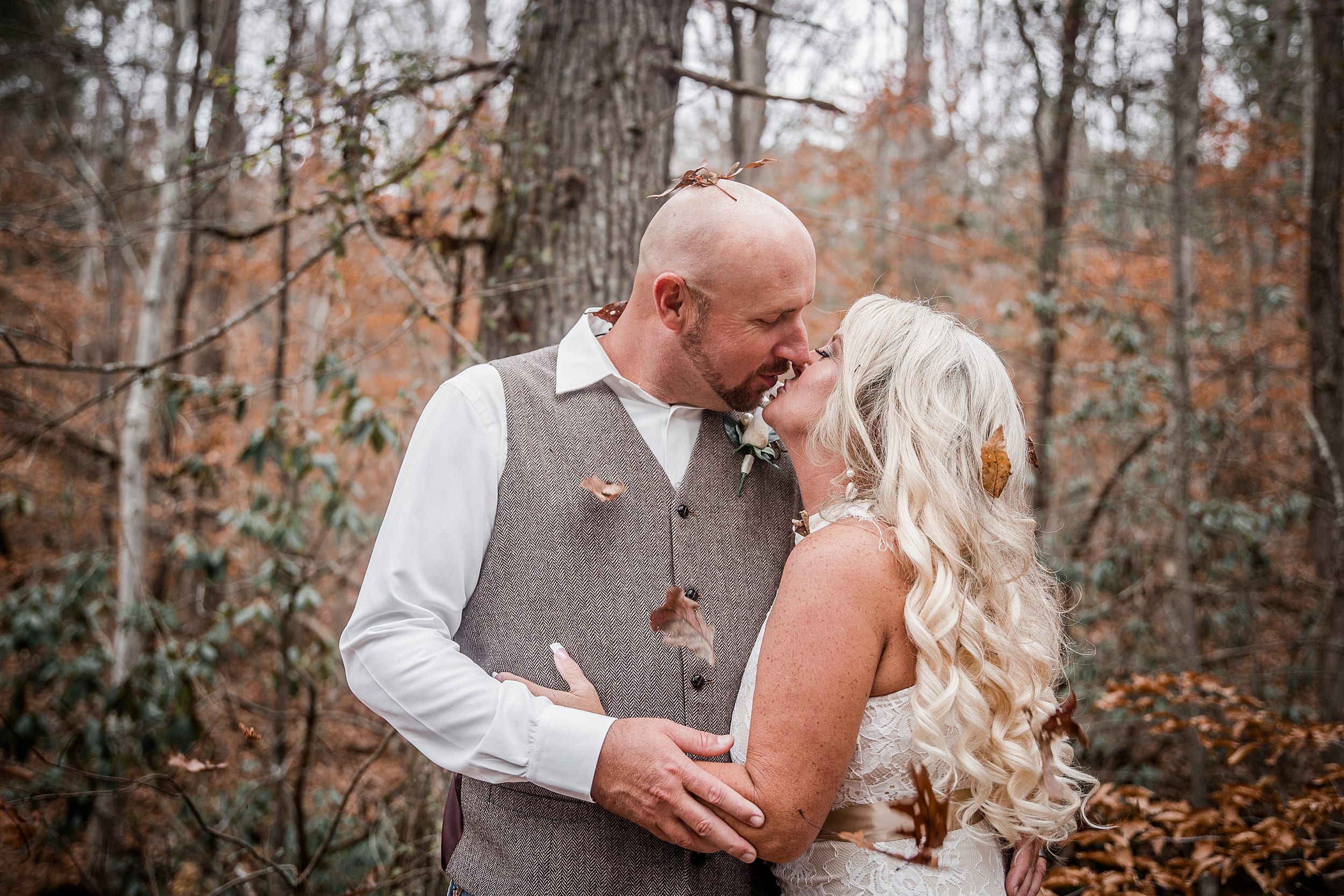Fall wedding with falling leaves during bridal portraits at a Chapel in the Hollow Smoky Mountain Micro Wedding.