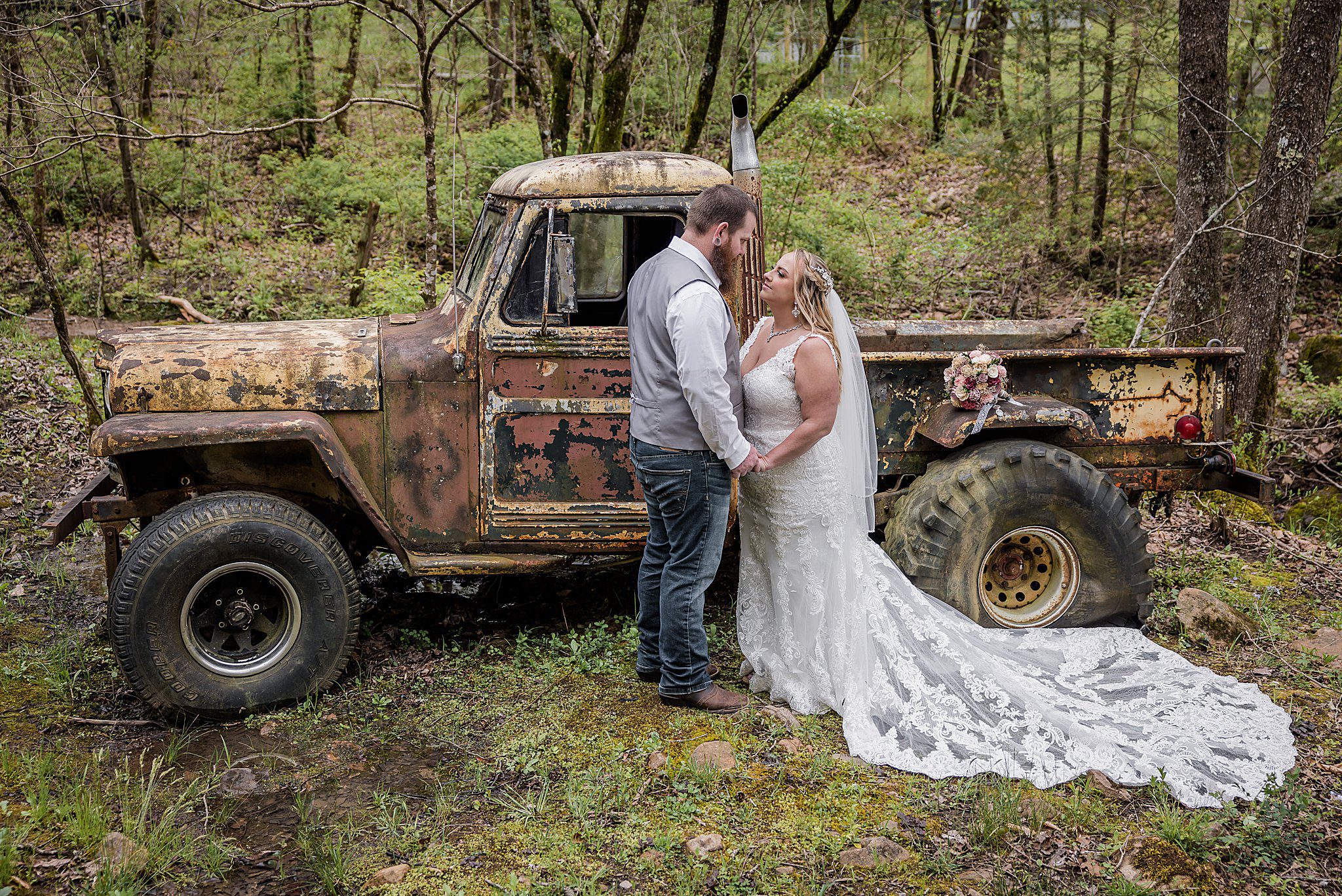 bride and groom with old truck