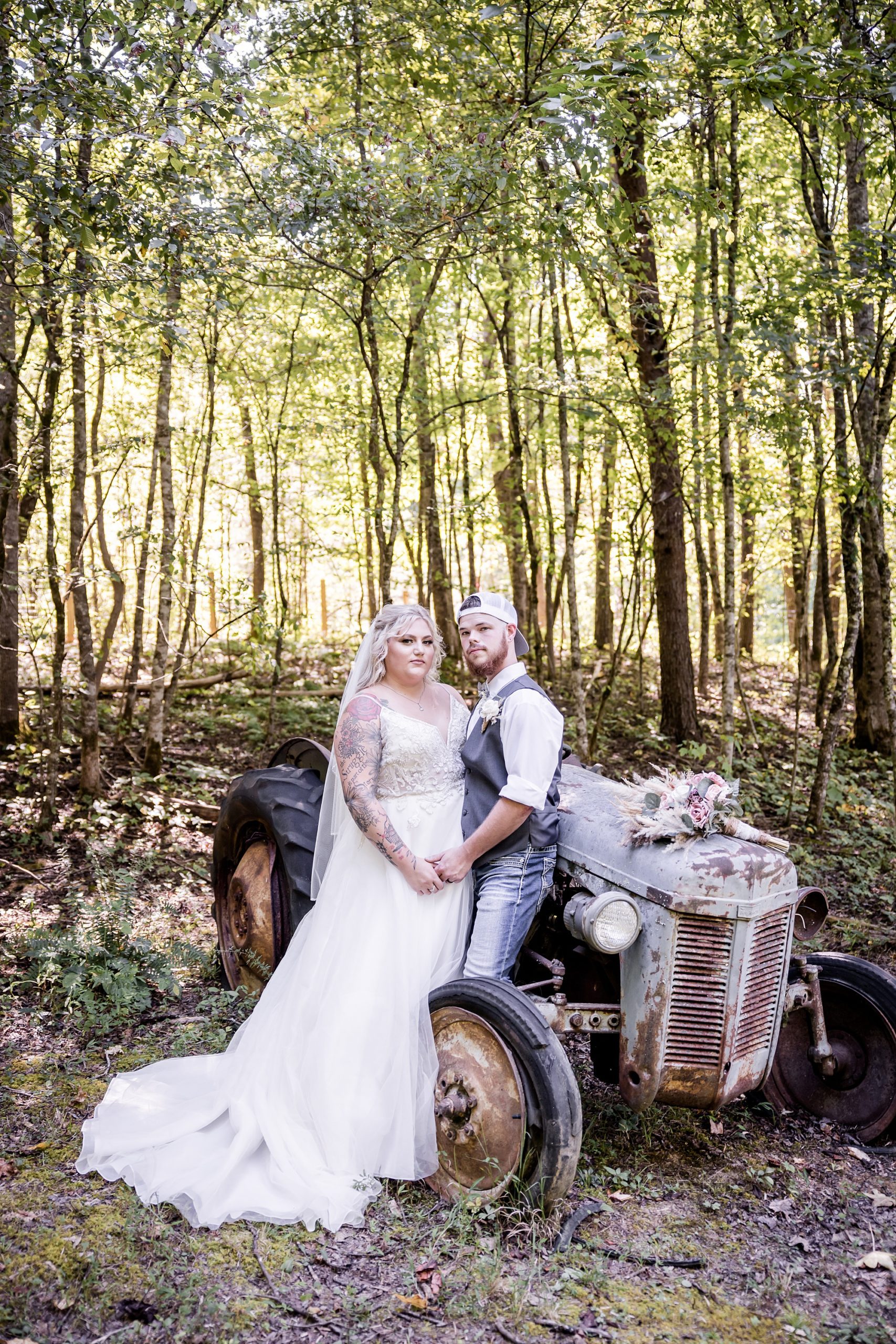 Summer Country Micro Wedding - Bride and Groom with rustic Tractor
