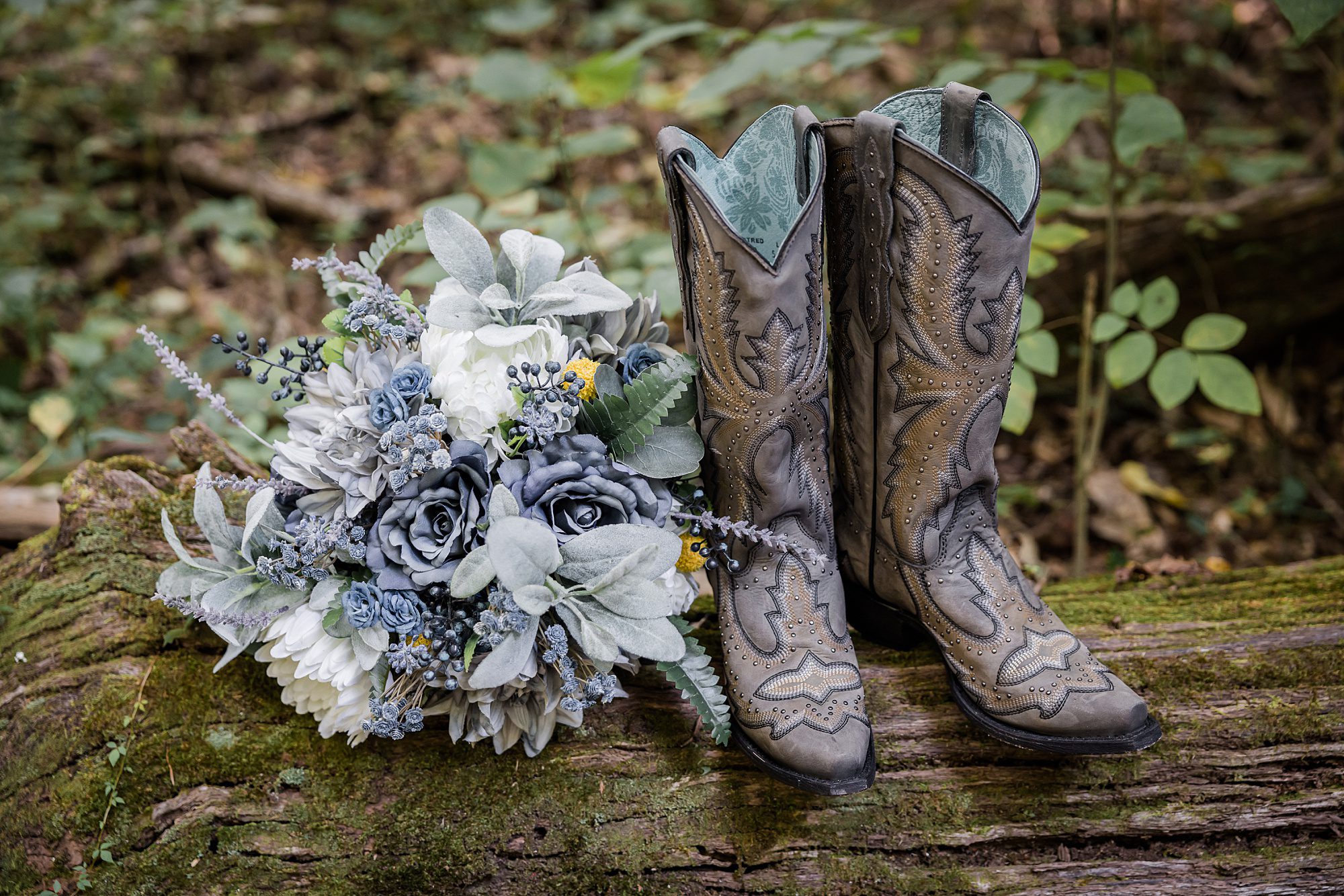 Wedding Boots and Bouquet on Log
