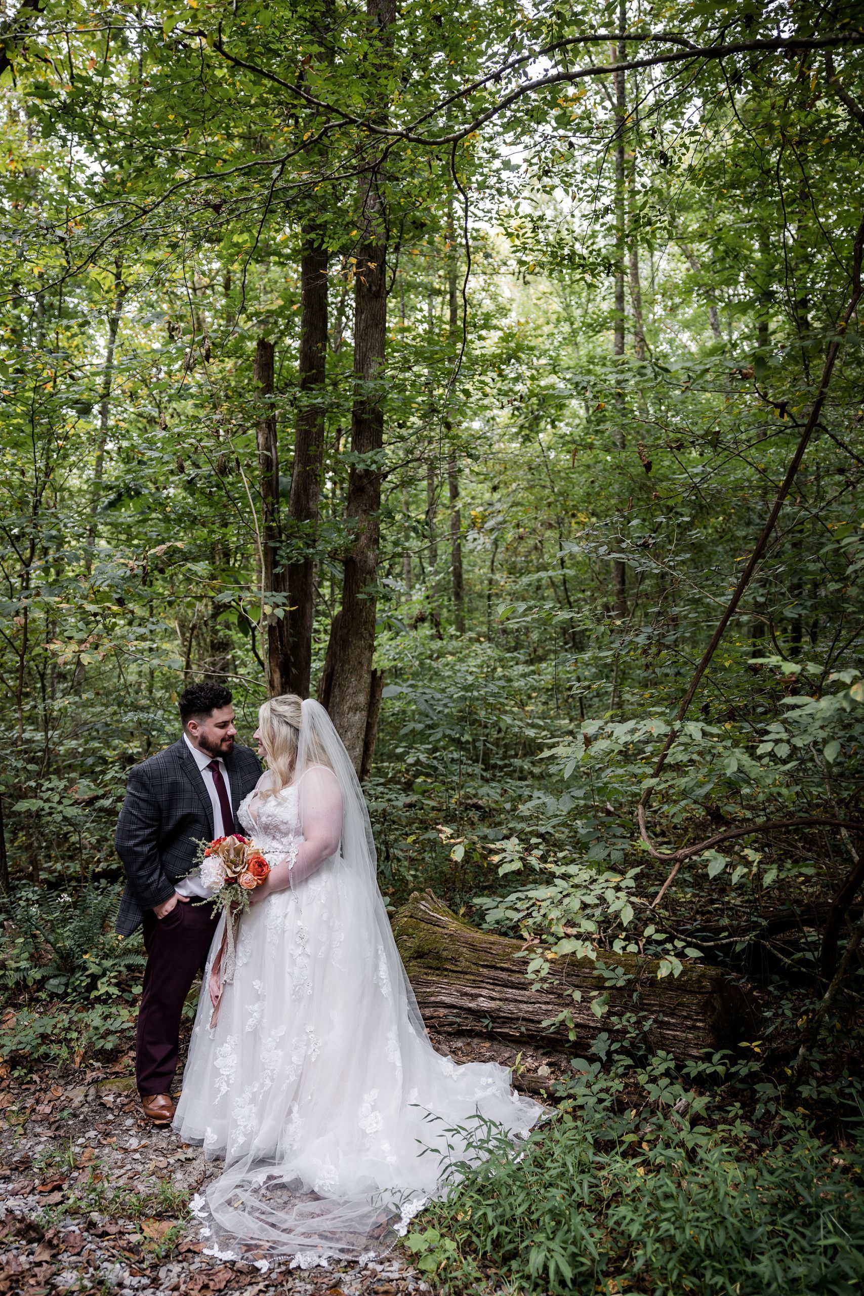 Bride and Groom Portrait by Log