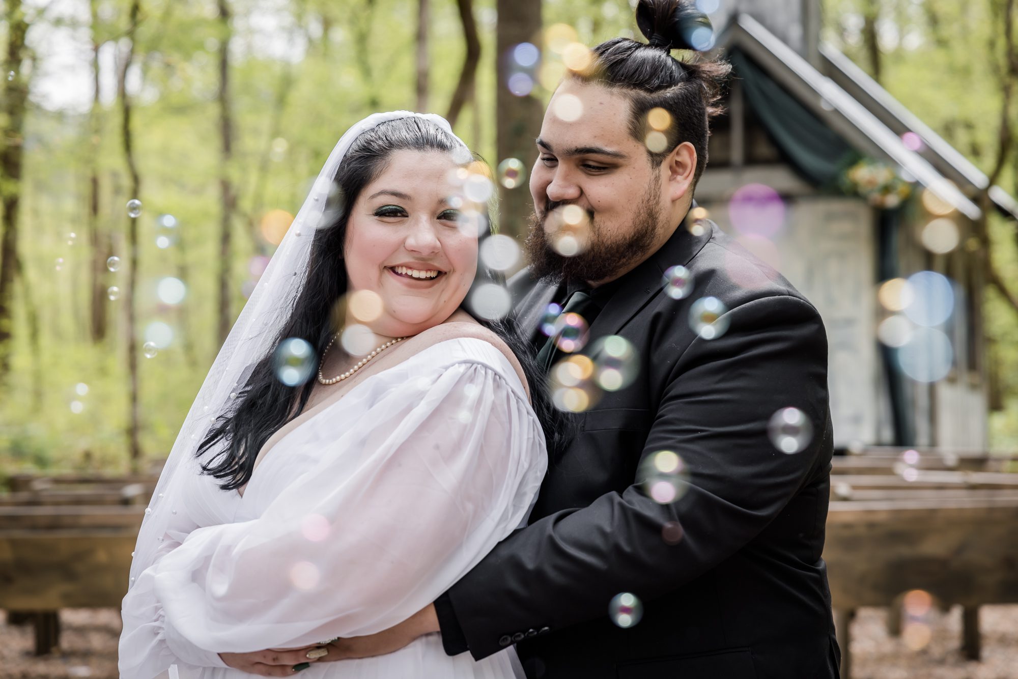 Bride and Groom Portrait with Bubbles