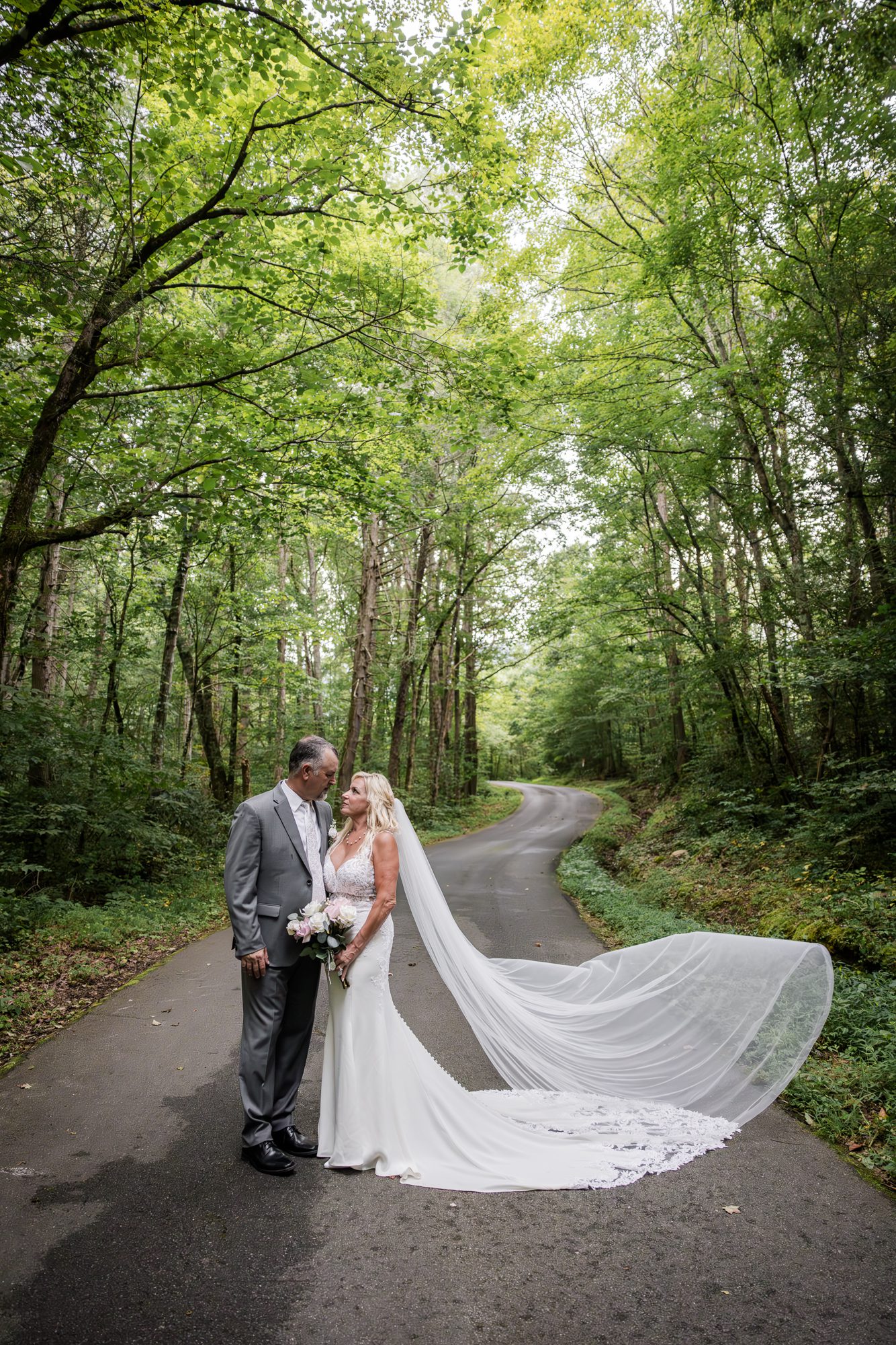 Woodsy Road Bride and Groom Portrait