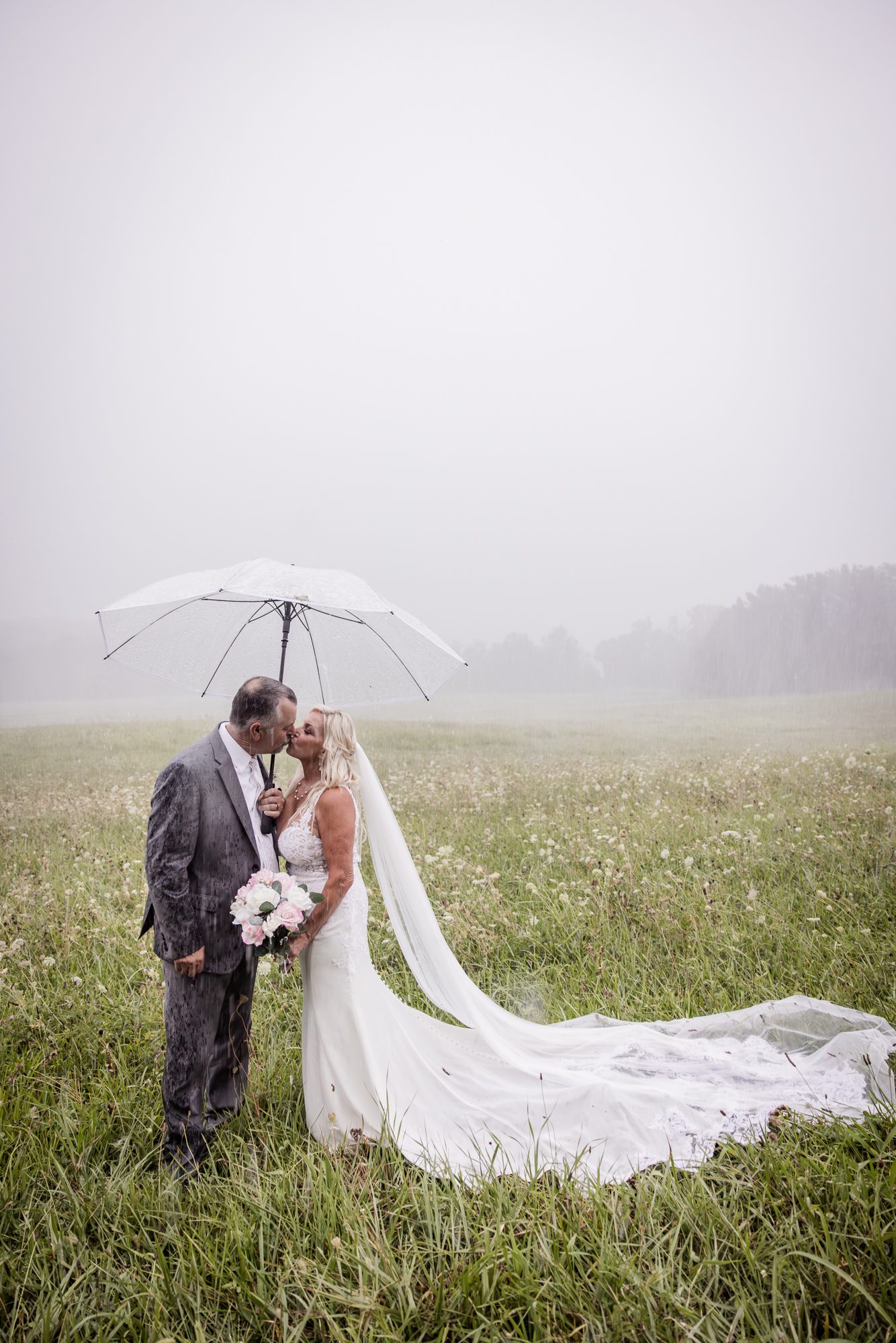 Rainy Field Bride and Groom Portrait