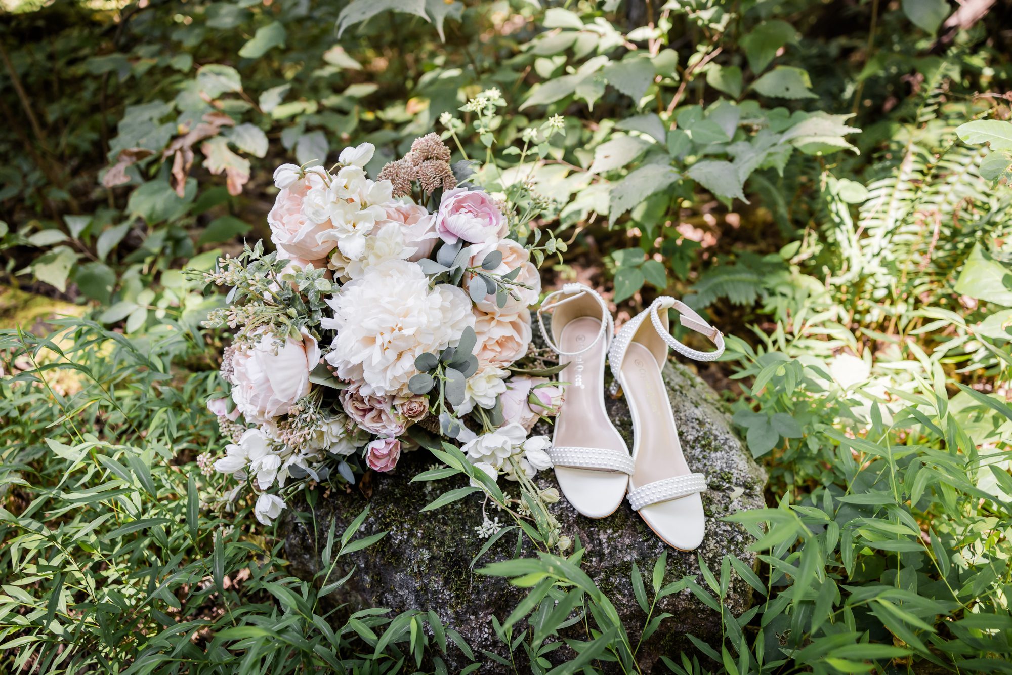 Bright and airy wedding bouquet and shoes