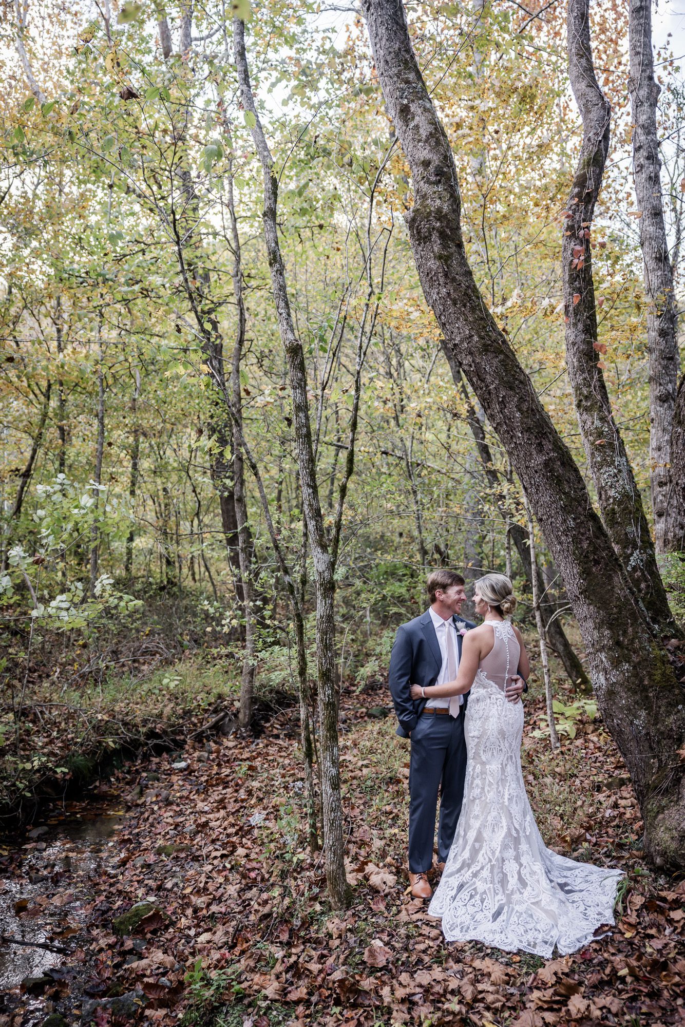 Creekside bride and groom