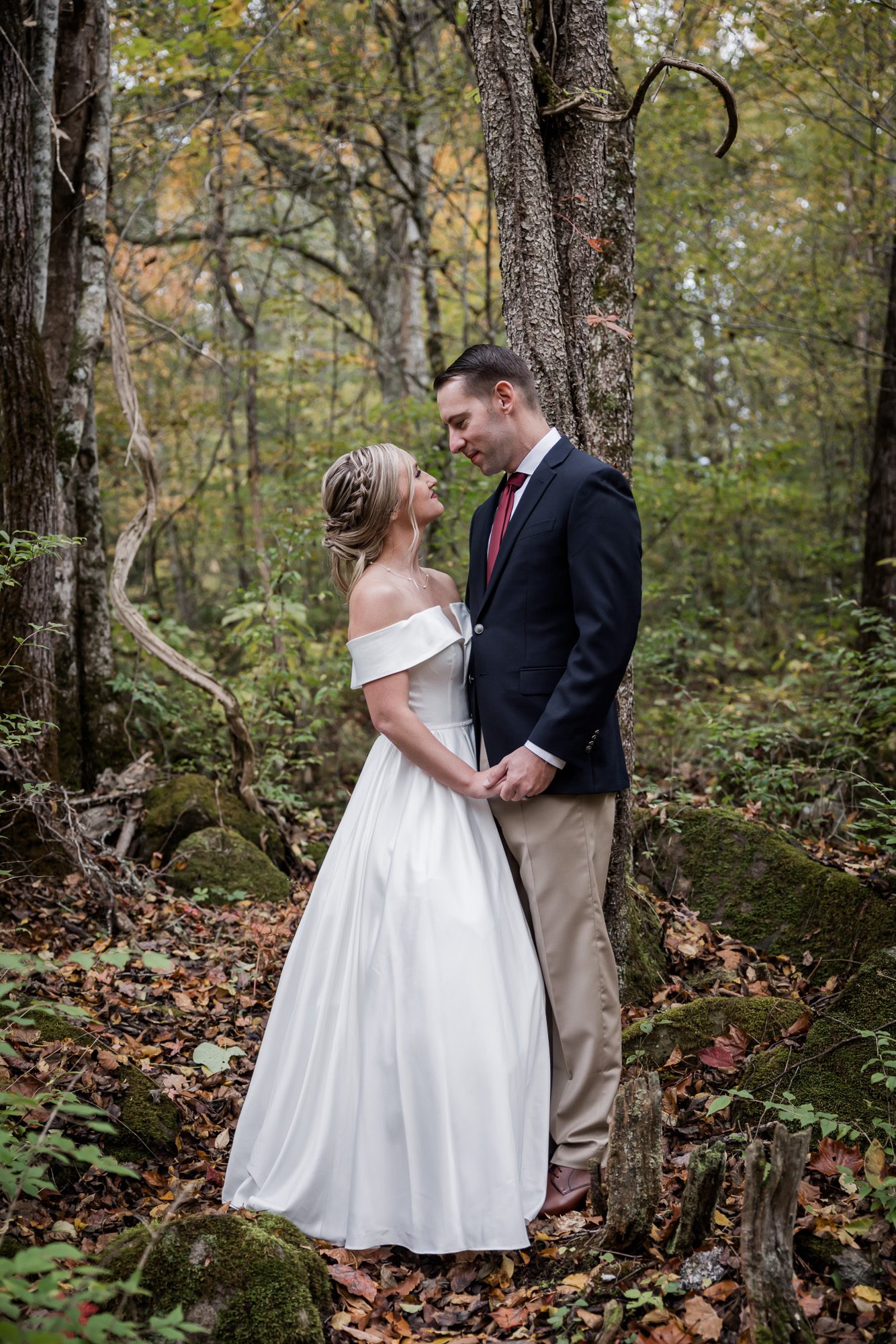 Woodsy bride and groom portrait