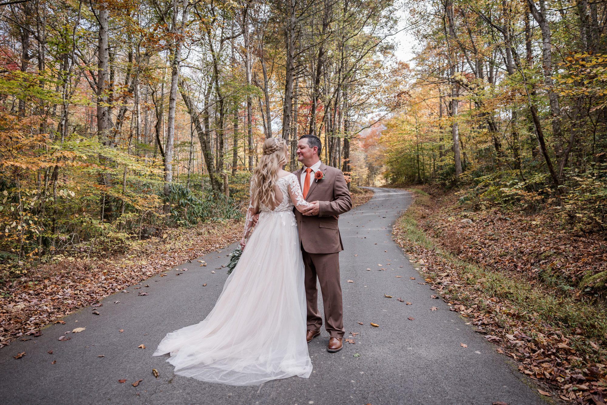 Woodsy fall bride and groom portrait