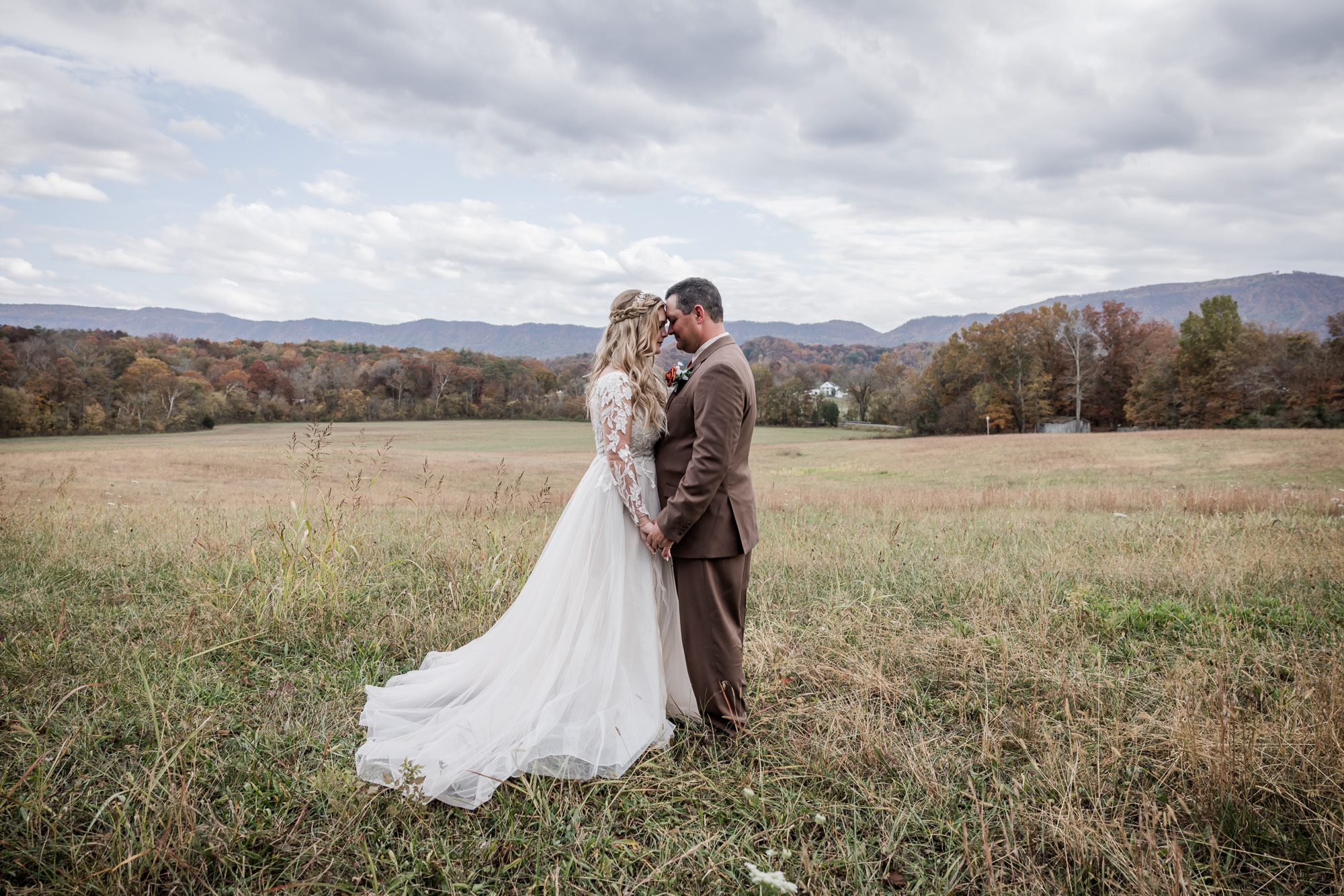 Field bride and groom portrait