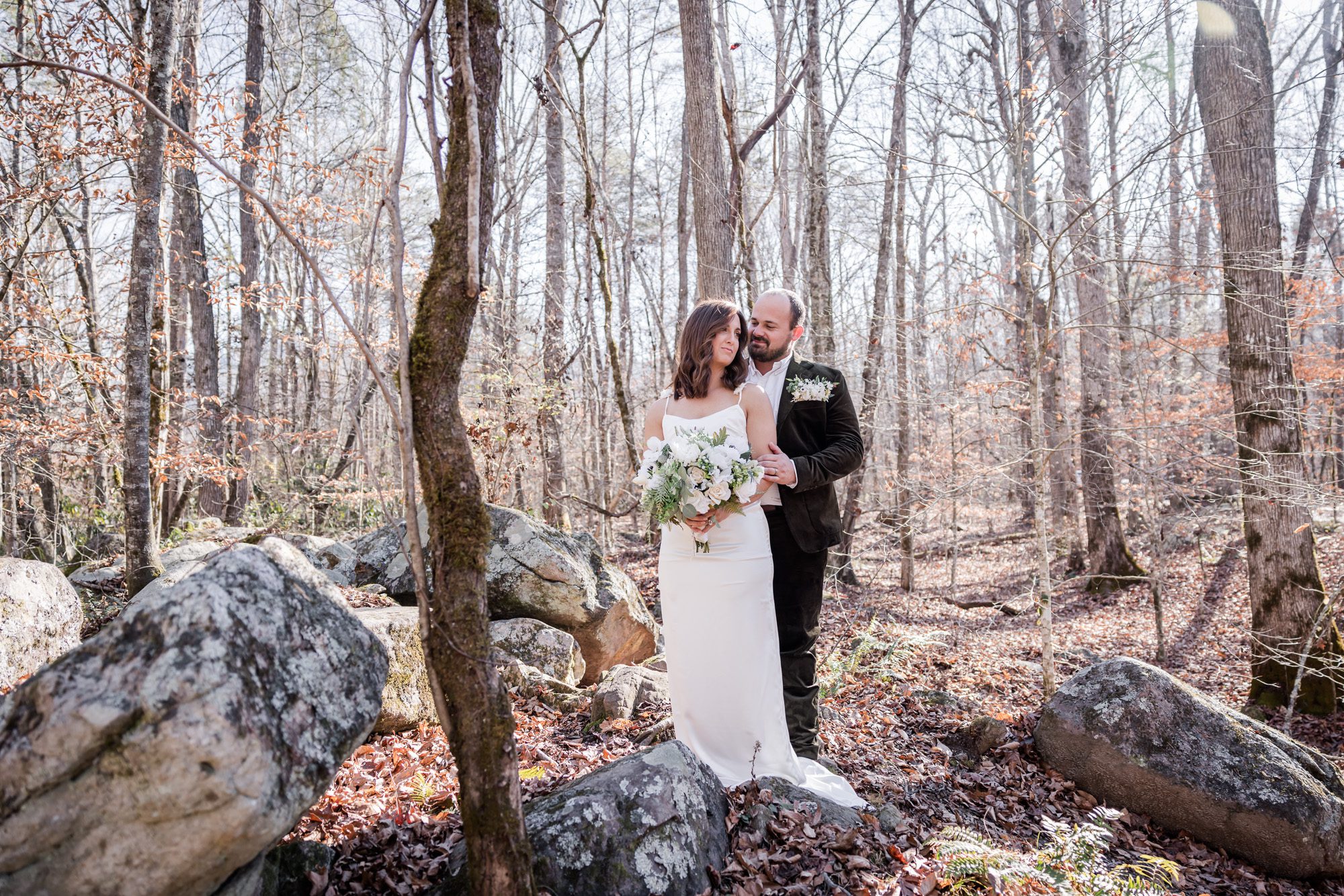 Woodsy bride and groom portrait