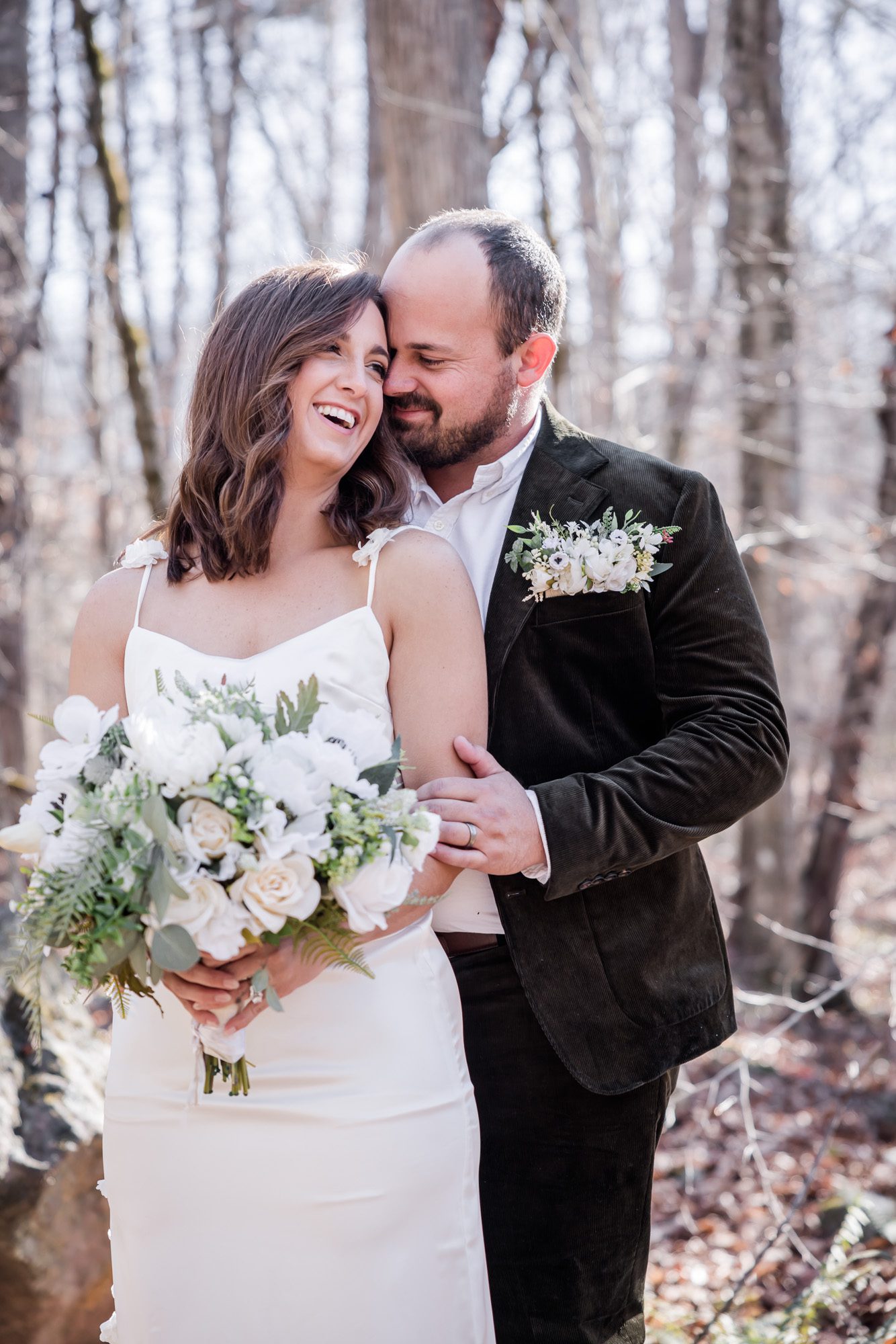 Woodsy bride and groom portrait