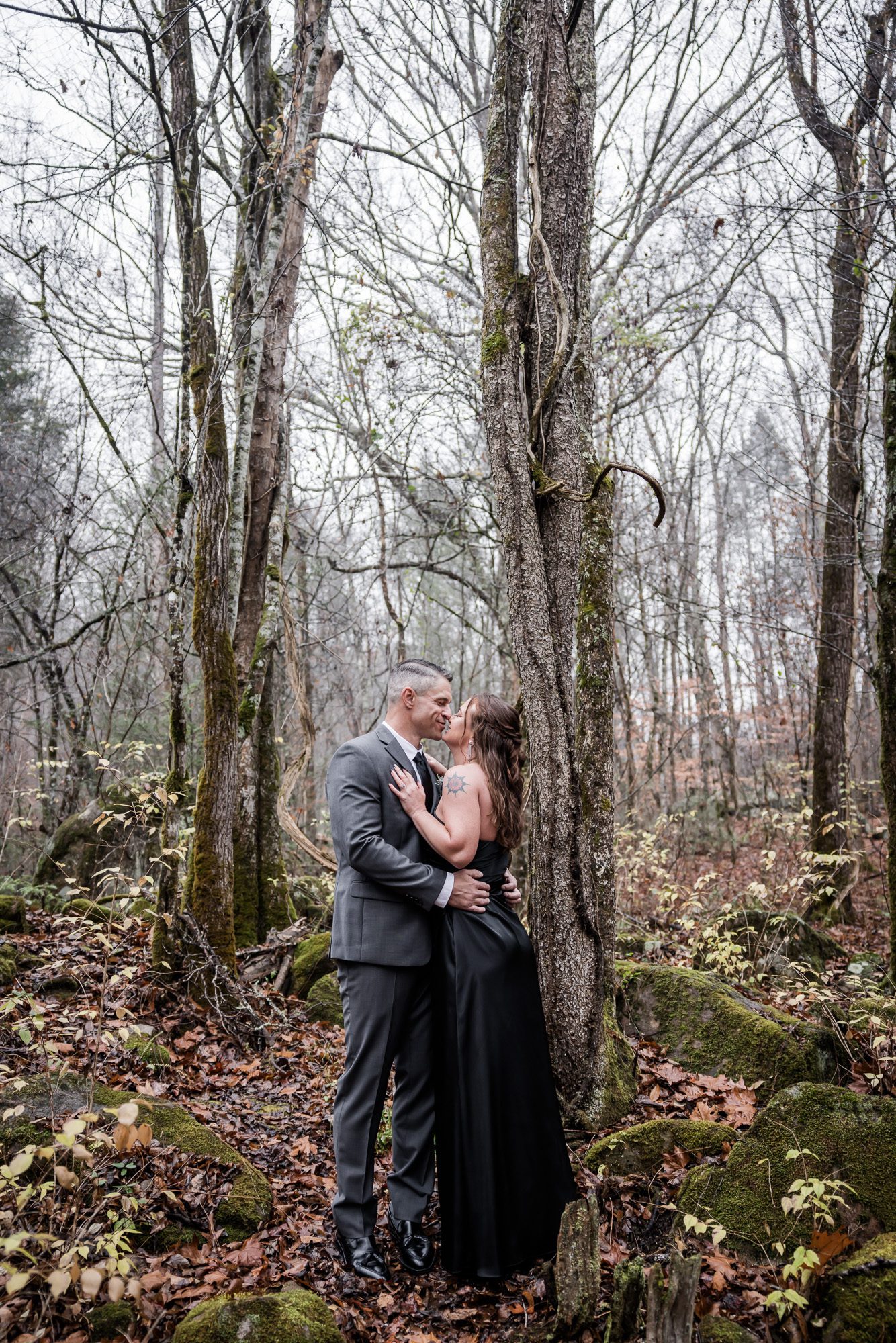 Woodsy bride and groom portrait