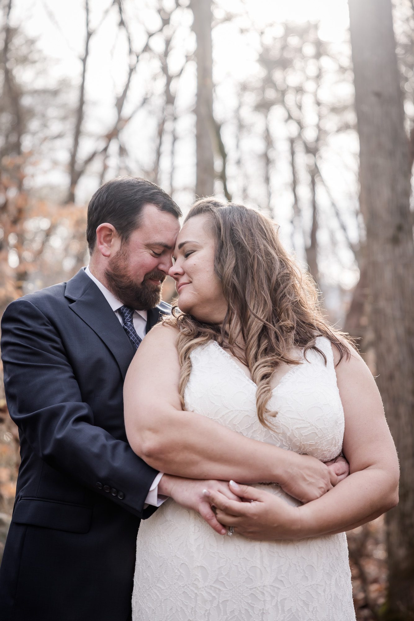Woodsy bride and groom portrait