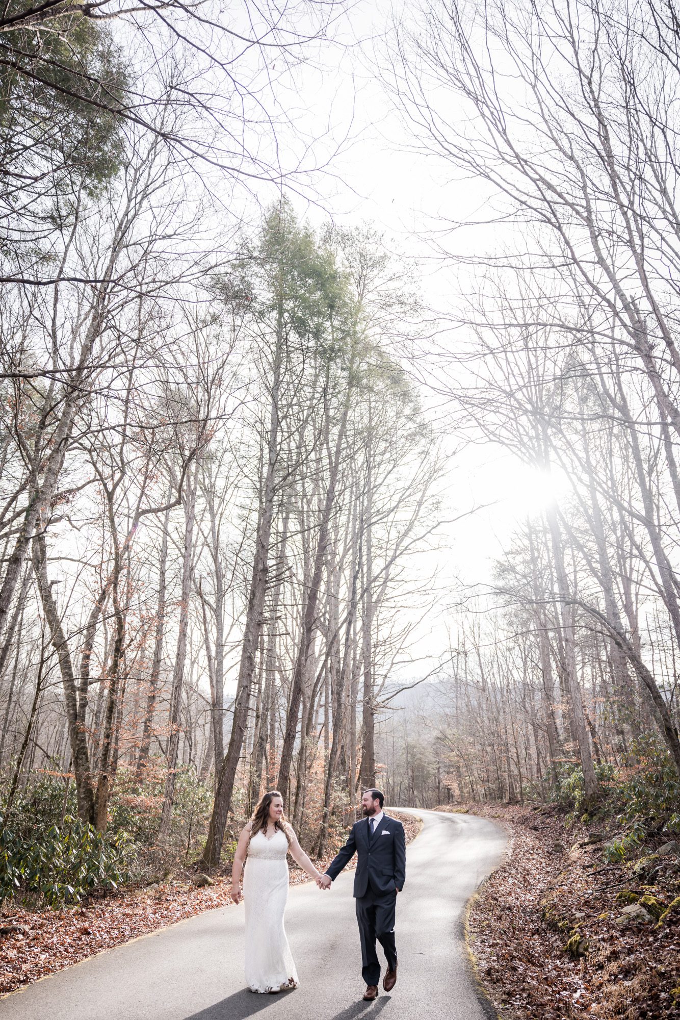 Forest in the winter bride and groom portrait