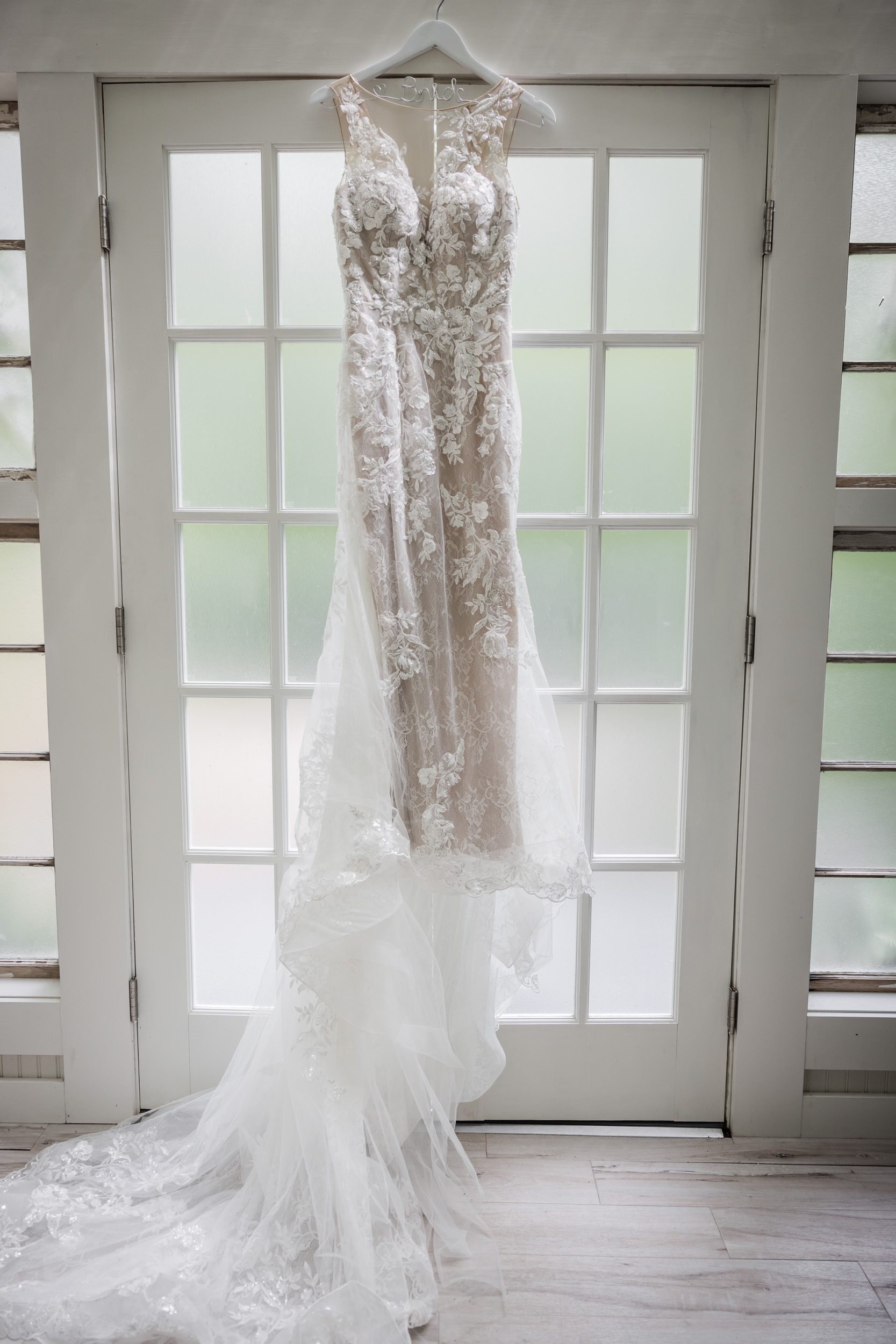 dress hanging in bridal suite